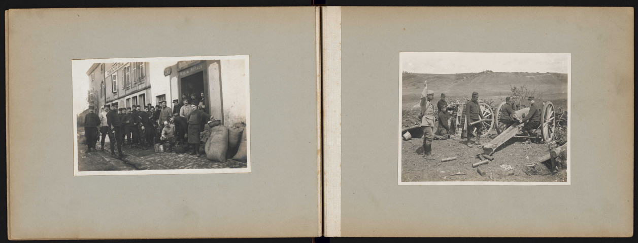 Un groupe de soldats devant une quincaillerie. Un canon en batterie.