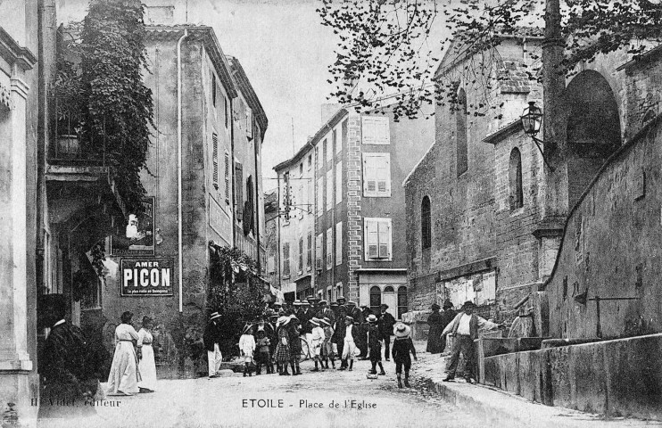 Étoile-sur-Rhône. - Place de l'église et Grande Rue.
